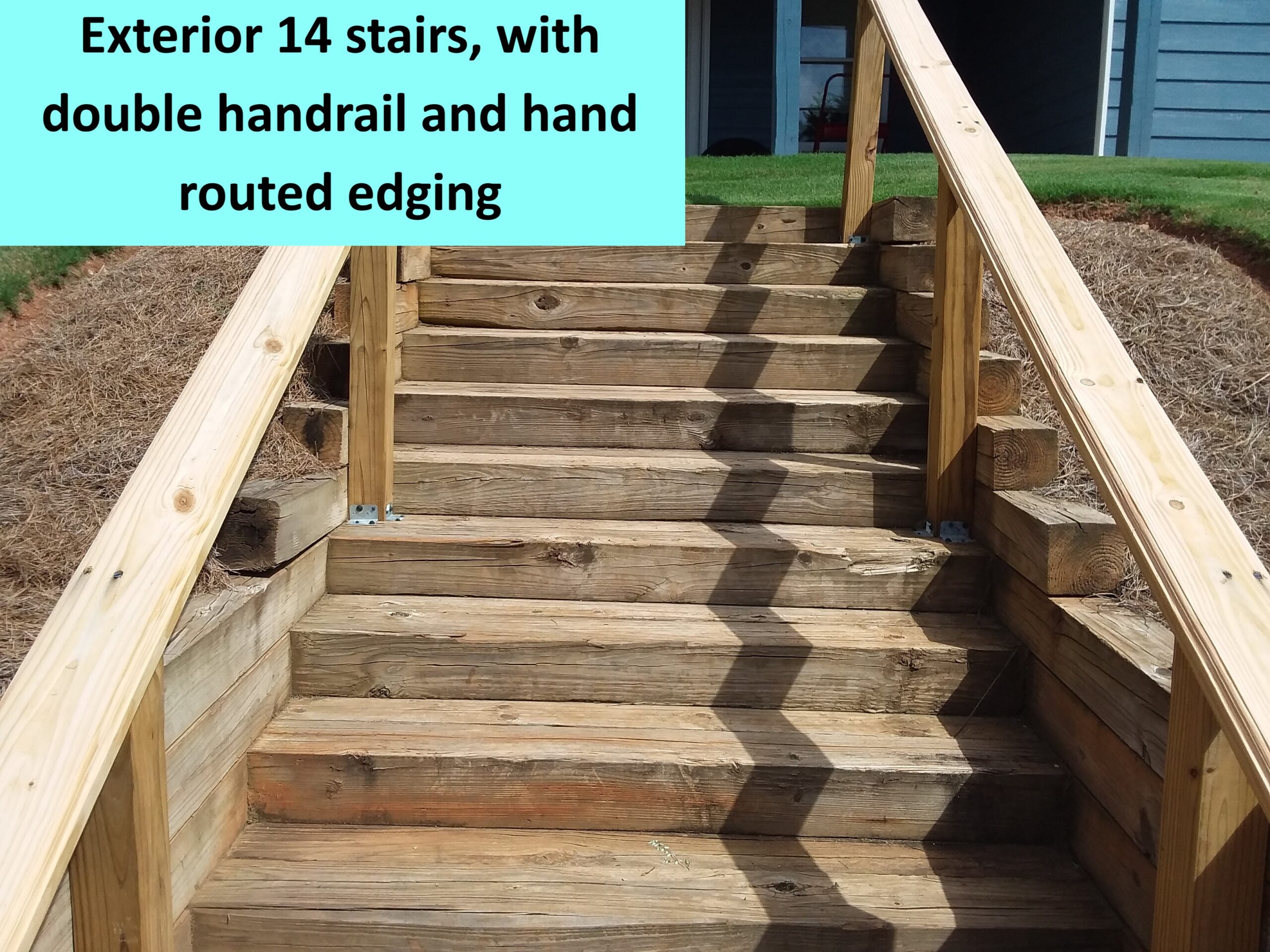 An exterior wooden staircase built by MGS construction in a backyard.